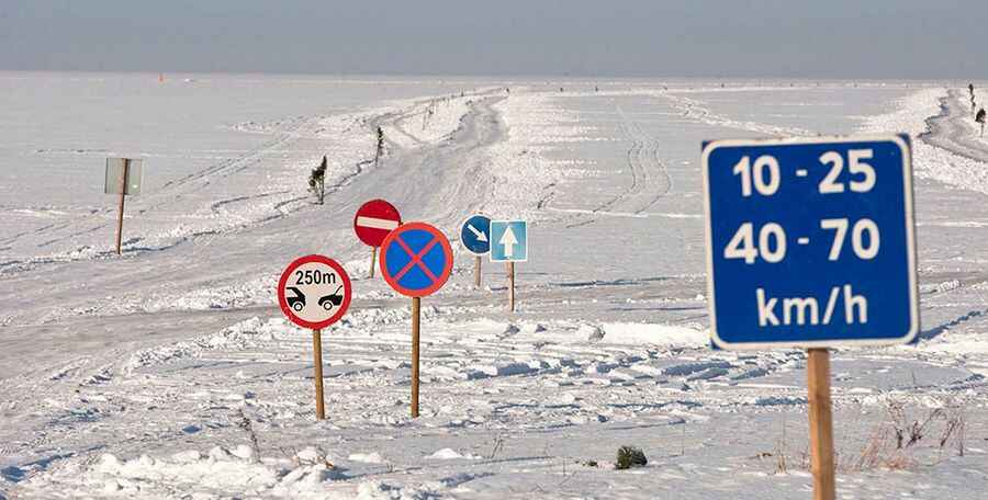 Driving the ice road from Rohuküla to Heltermaa in the Baltic Sea