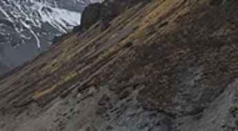 4x4 vehicle driving on the new high-altitude road under construction between Jomsom and Rara Lake, Upper Mustang, Nepal