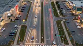 Highway Access, Retail Corridors, and Pedestrian Risk in Urban Crash Zones