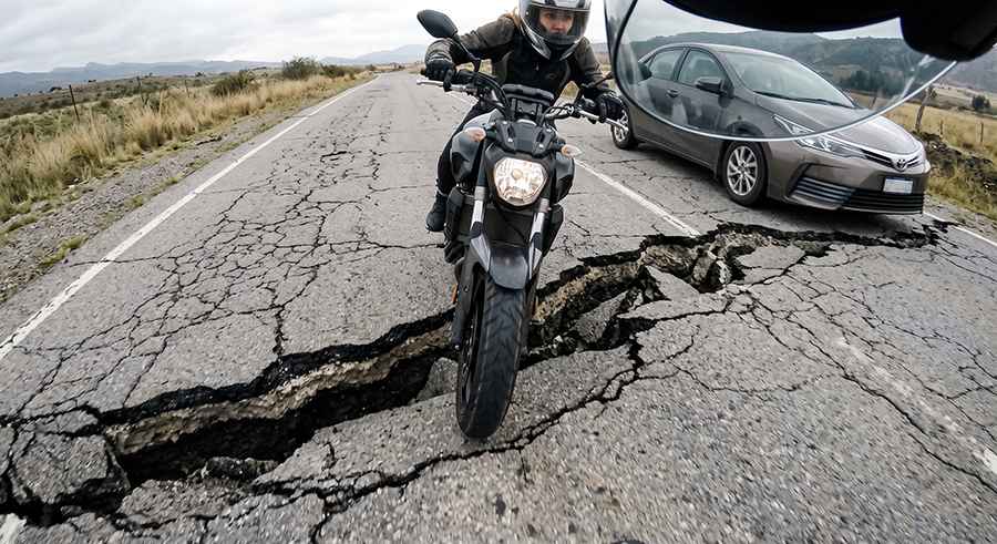 The Pothole That Annoys a Driver Can Terrify a Rider